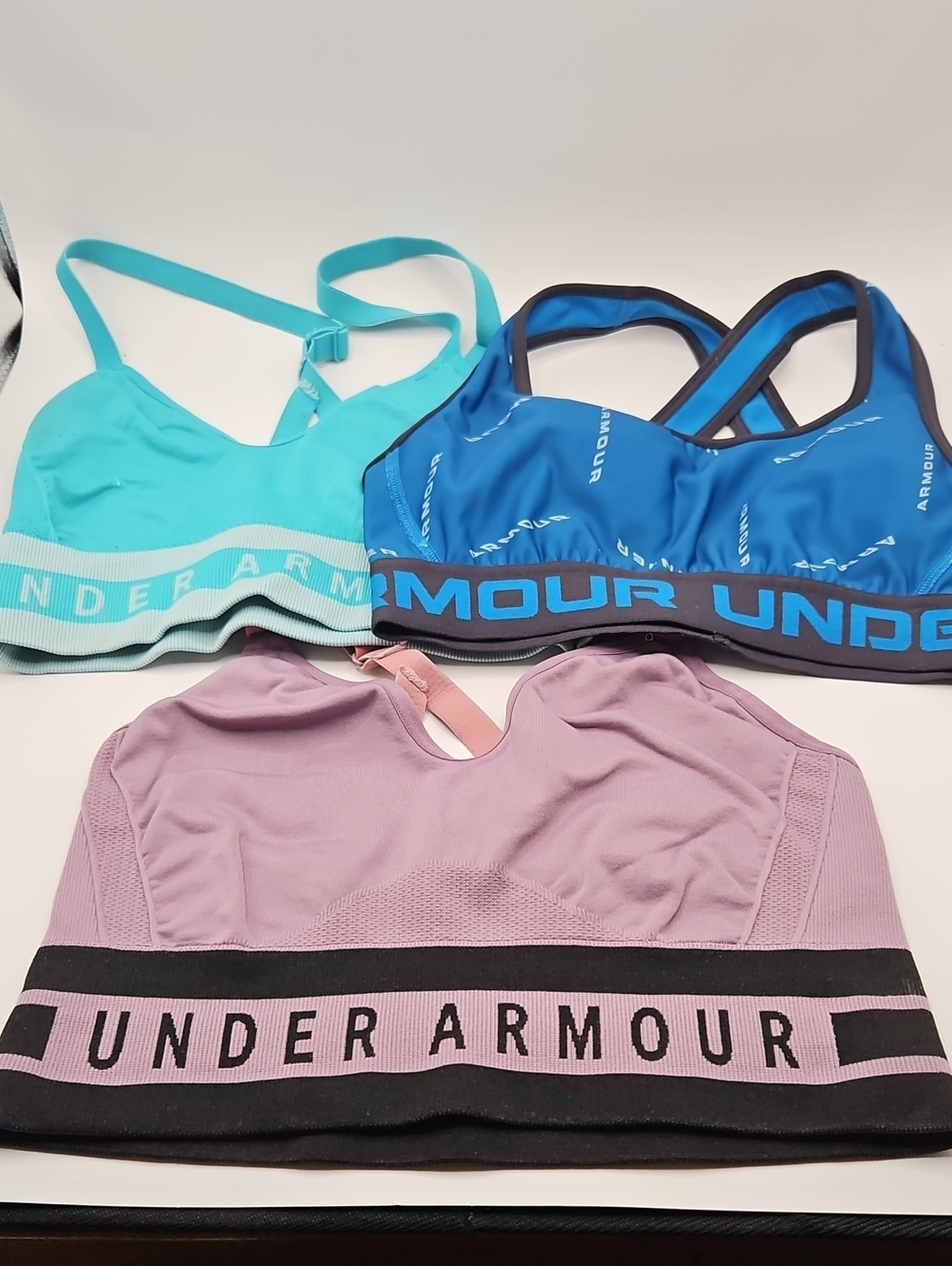 Under Armour Seamless Sports Bras in Teal, Blue, Lavender XXS Lot Of 3